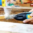 Multiherramienta oscilante con  rascador, cuchilla, lijadora